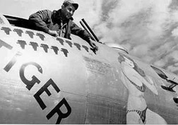 Wayland proudly paints the 25th mission on Tiger Lil, Yokota, 1950